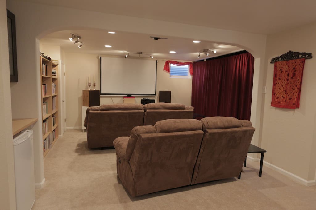 Movie room with big screen and Netflix