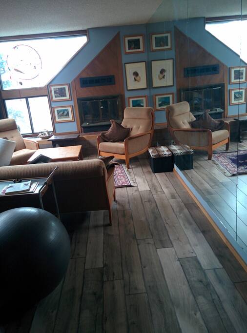 cozy livingroom full of local artwork
