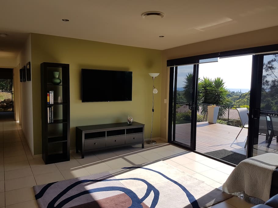 Relax in the lounge room. 55" LCD TV.