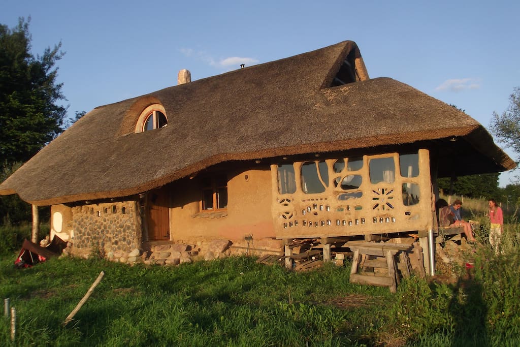 The west side of straw bale house with the ground floor terrace.