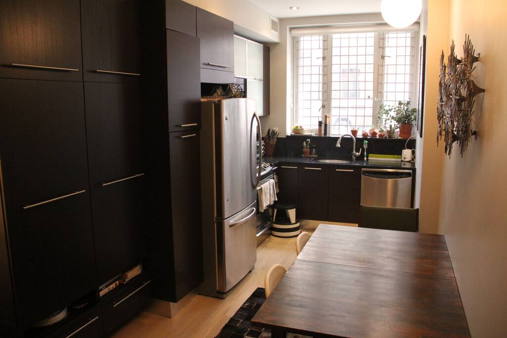 Bright kitchen and dining combo with room for 4+ at the table.