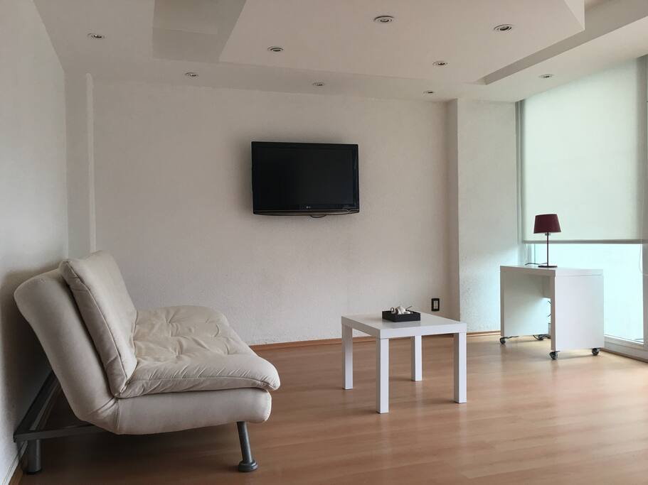 Estancia con sofá/cama