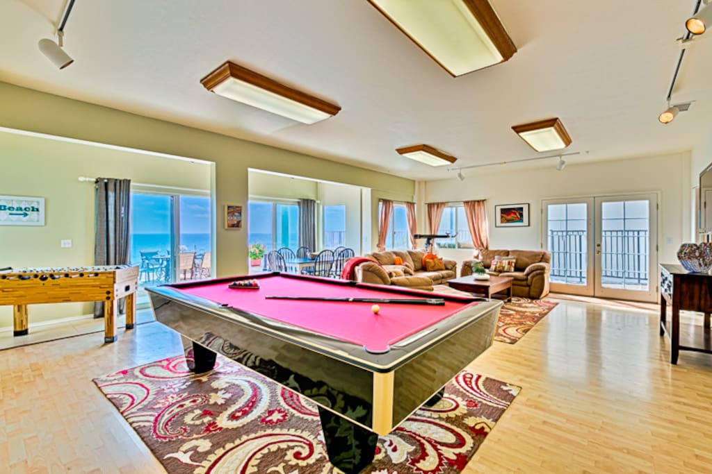 Full size 9 foot pool table. Foosball table and endless views out the window.