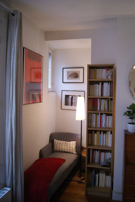 Chaise longue in corner of living room.