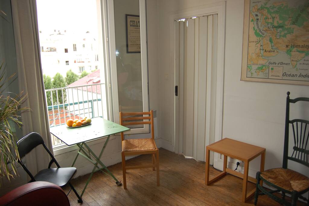 eating and living room with a big window