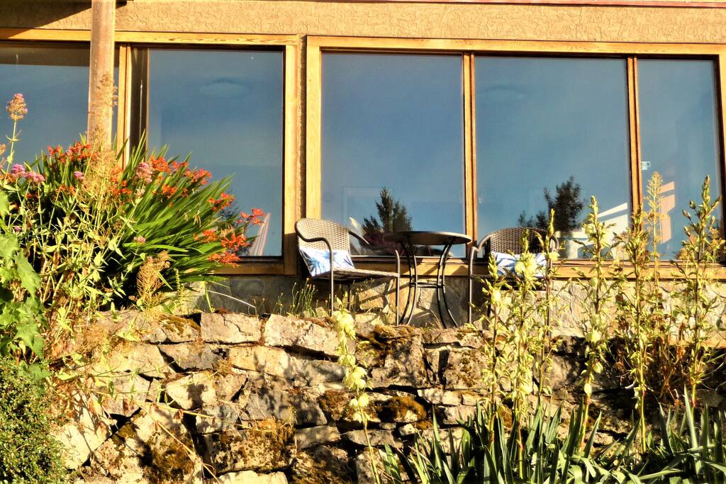 The suite with one of several outdoor sitting areas - exclusively for you -features stepped gardens in addition to amazing views.