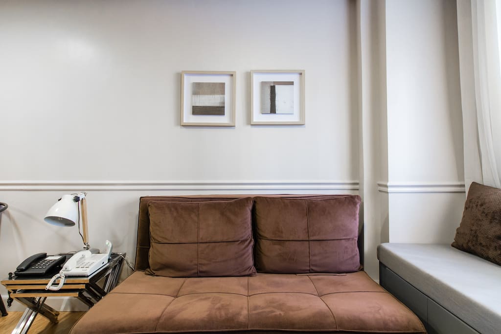 This is your home away from home. Read a book on this cozy couch.
