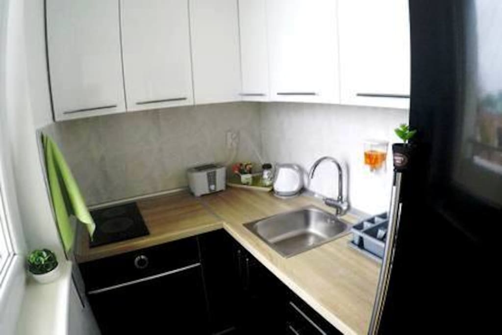 Enjoy preparing your coffee and meals in modern kitchen