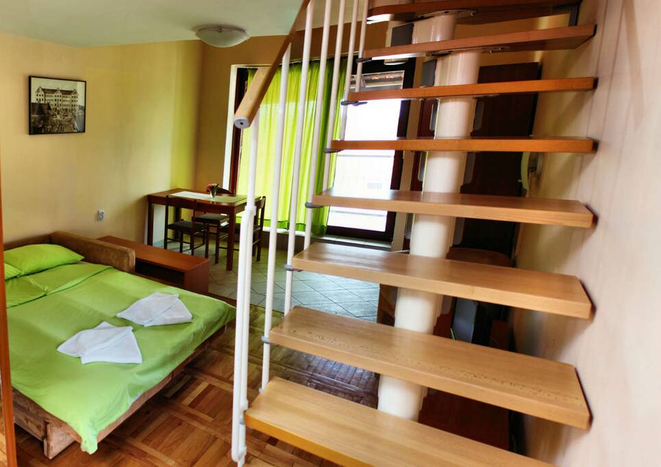living room, dining area, sofa bed