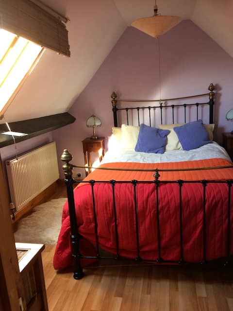 Comfortable private attic room in shared cottage