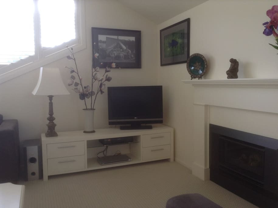 The sitting room is cosy with a gas log fire, two sofas and a TV and DVD player plus a selection of DVDs.