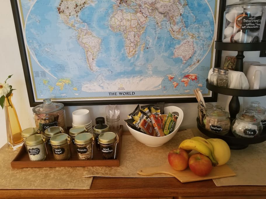 Oatmeal bar with toppings, beverage station, fruit & snacks
