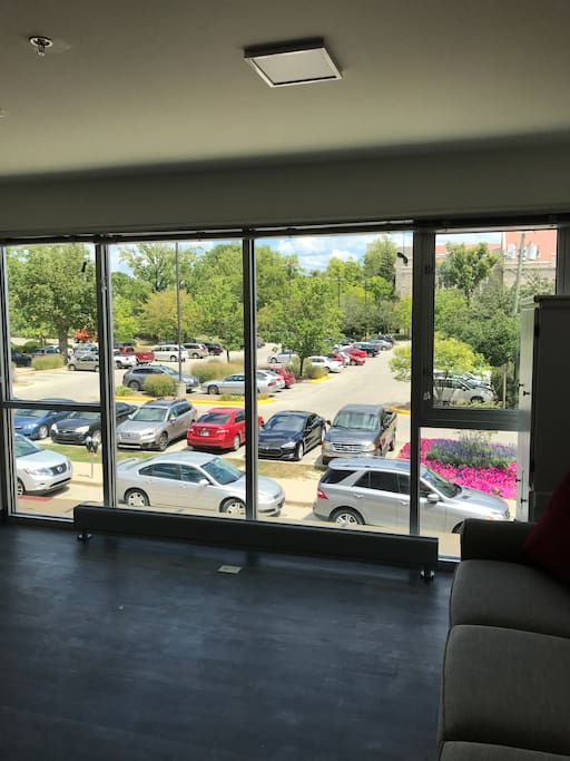 Views of campus and surrounding streets with blinds for privacy.
