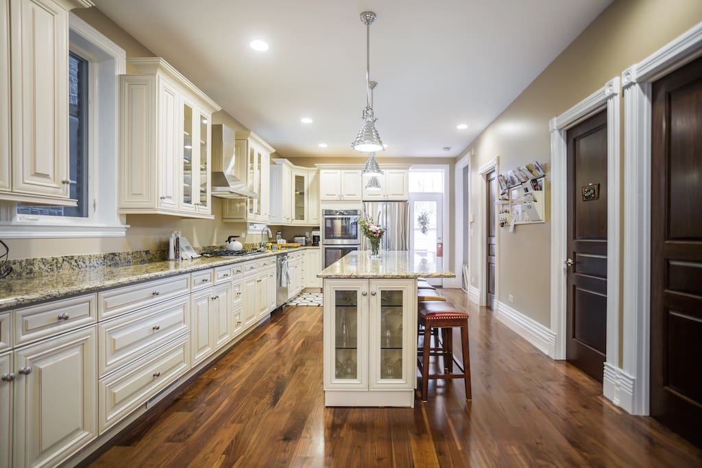 Fully equipped kitchen and access to the walk out deck and grill.