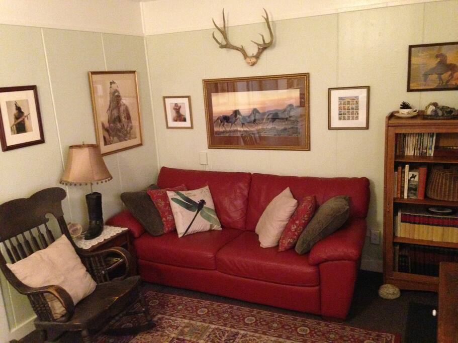 Curl up on the leather sofa or kick back in the antique pressback rocker to read or watch TV.