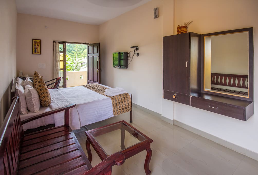 The room is furnished with simple and elegant decor