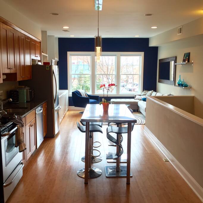 Kitchen looking into living room