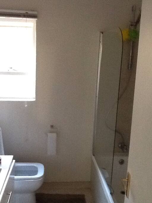 Bathroom with shower and bath facilities