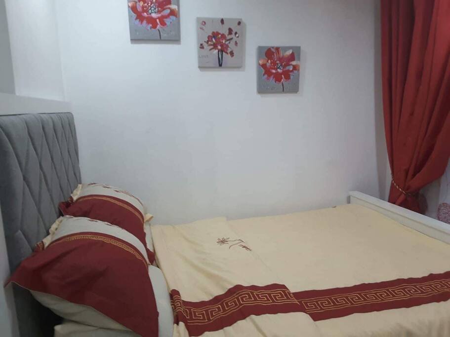 a customized double bed with a pull out single bed with comfortable mattresses