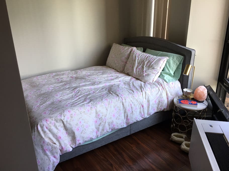 semi-private bedroom (1/2 wall separating bedroom from living room)