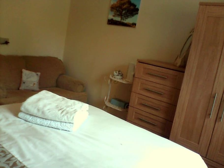 Storage, tea and coffee and small sofa.