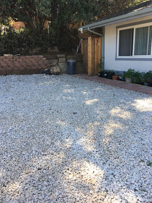 White gravel in front of the room