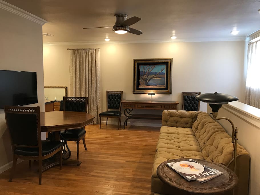 Smart TV with Netflix, across from top of stairs.