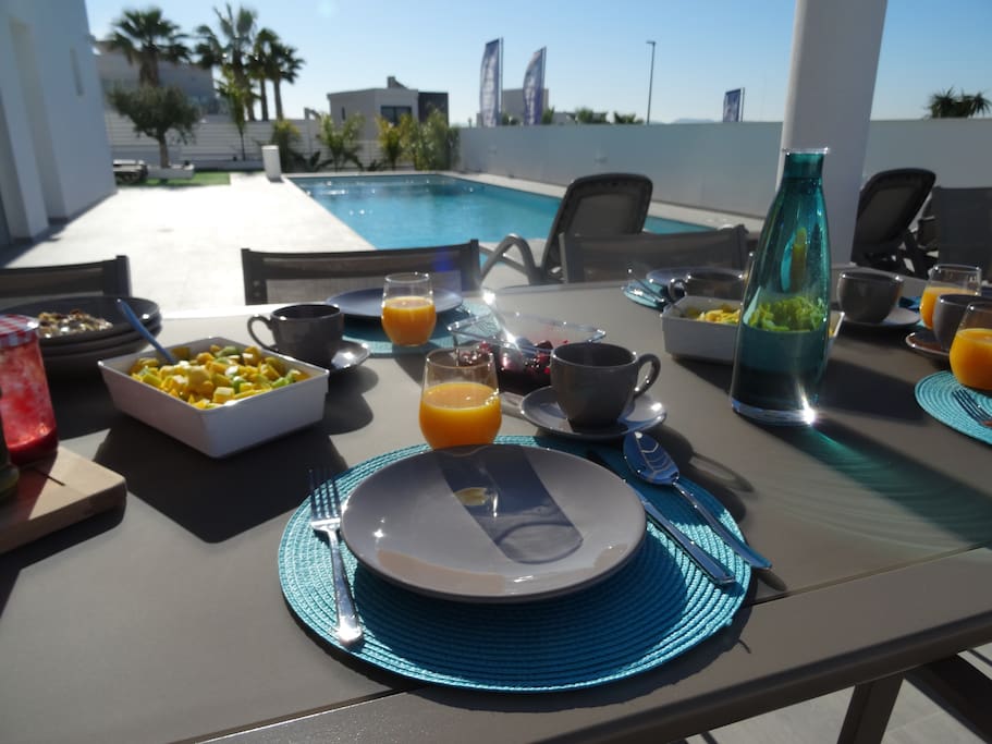 Have breakfast next to the pool...