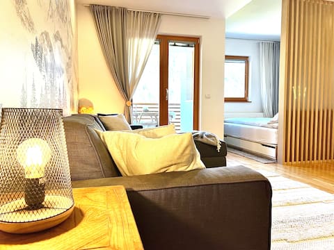 Popular Airbnb listing: The Mountain Girl - Cosy Central Apt/Garage in Podkoren