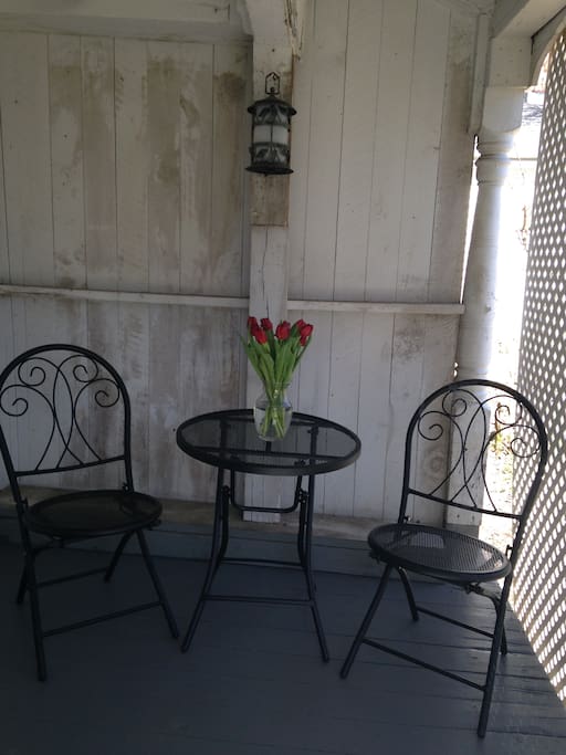 cafe seating on porch with river view