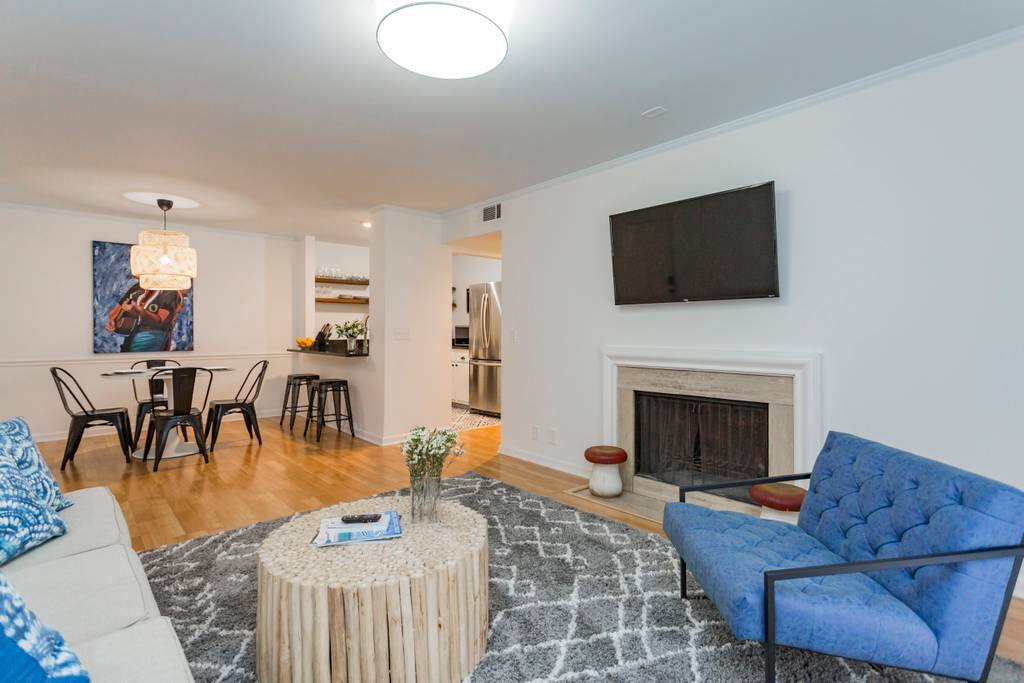 Living room with queen sized sleeper sofa and breakfast nook