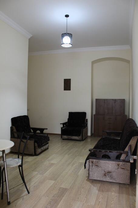 Guest room with one folding sofa bed and two folding armchairs