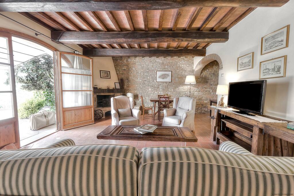 One of the 2 livingrooms with fireplaces inside the COTTAGE
