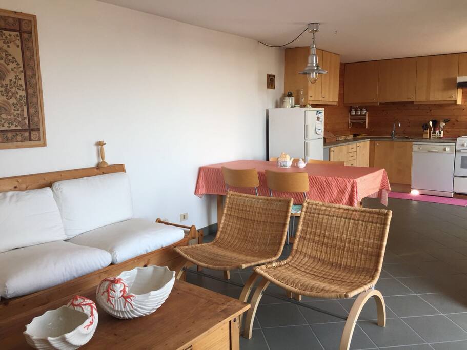 Well equipped kitchen and living room upstairs