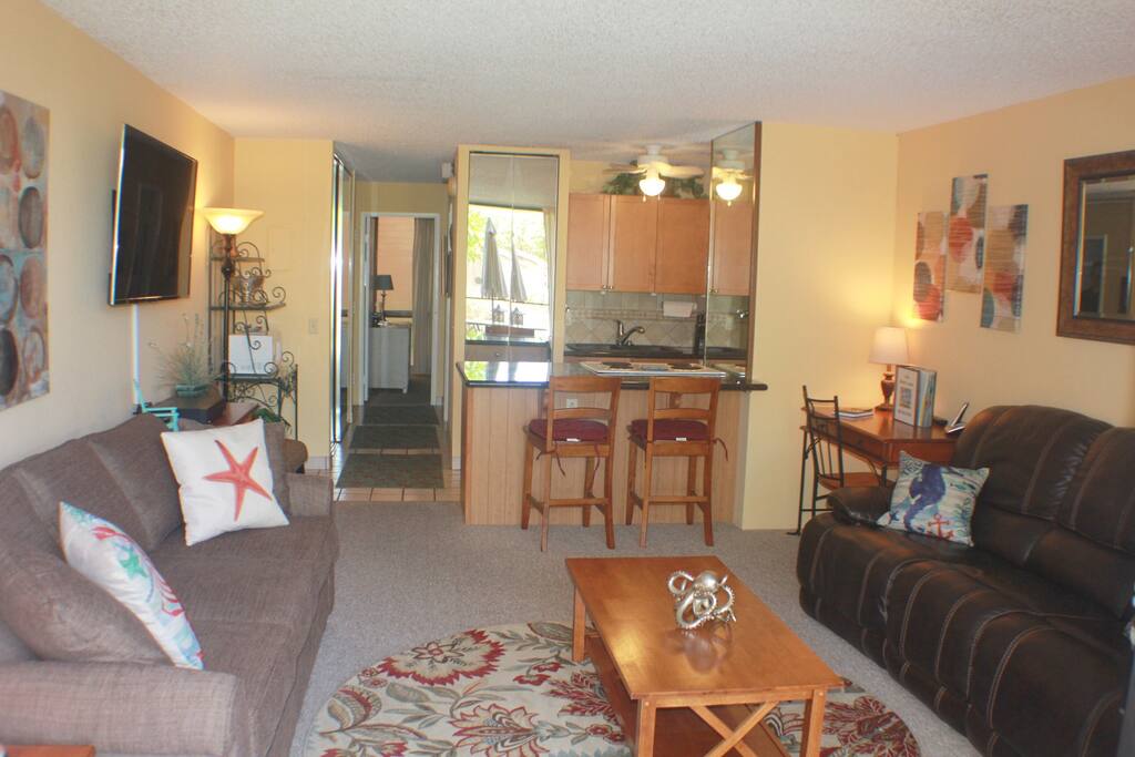 Wonderful spacious living room with leather theater seating recliner's, and a memory foam mattress sleeper sofa.