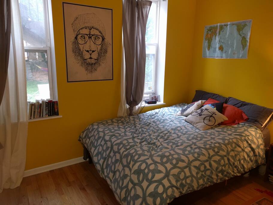 The main bedroom is giant and looks out onto our garden.