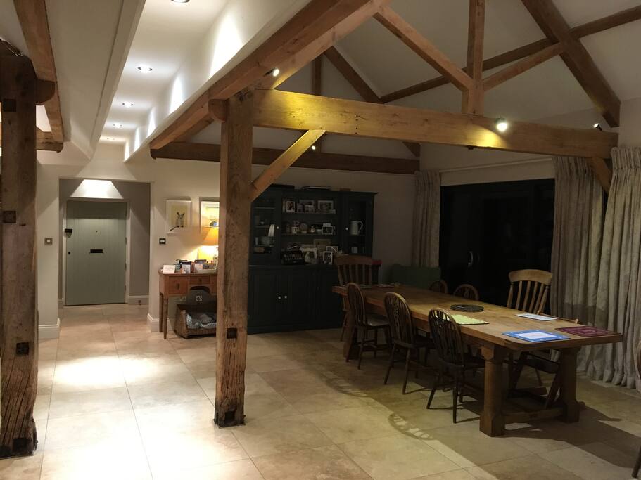 Open plan living area looking at the front door and entrance hall.