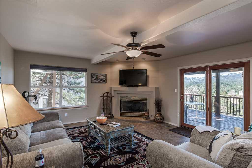 Spacious Living - The living room provides a large screen TV and plenty of seating for everyone to gather around and also provid