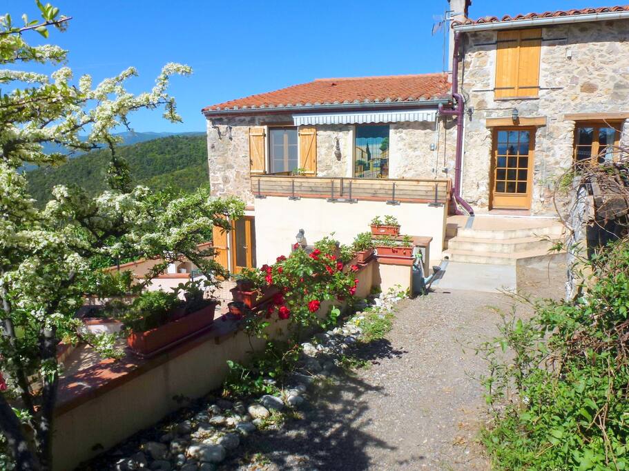 Our farmhouse built onto the mountainside
