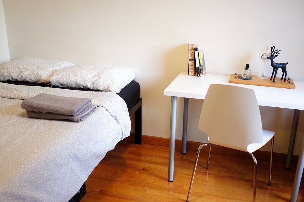 Spacious desk for writing postcards from the big Apple.