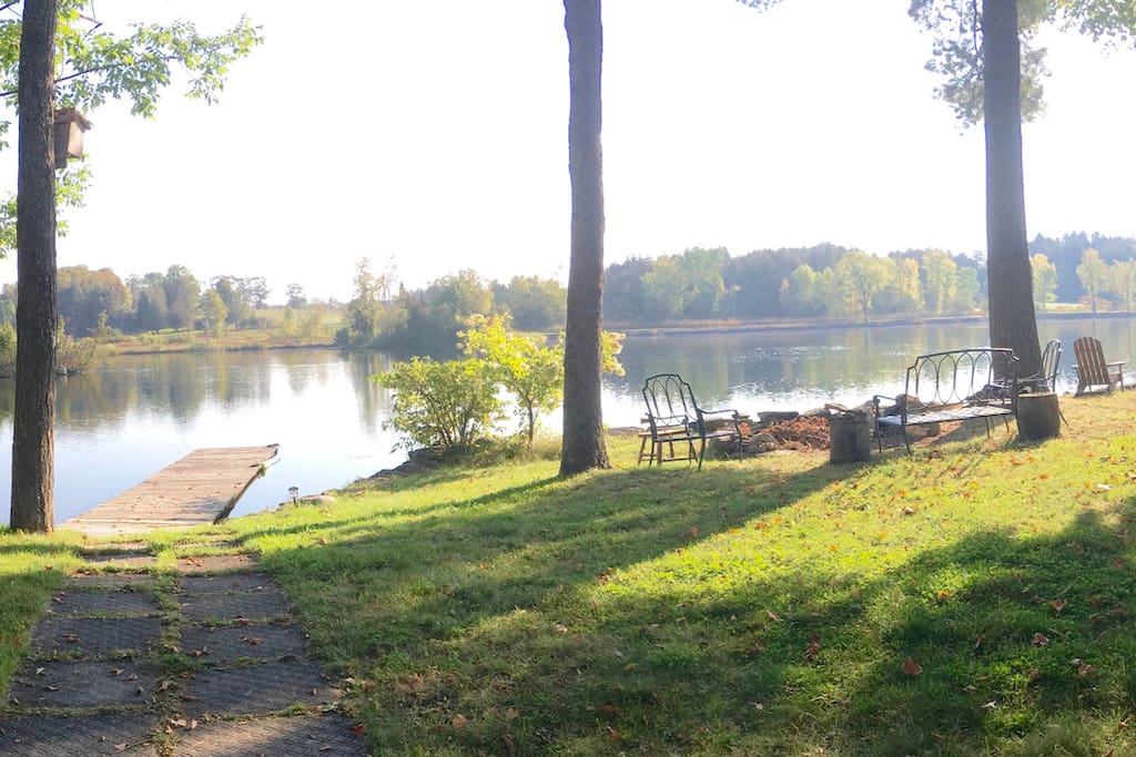 Over a 100' wide level lot with massive Bonfire Pit and plenty of seating