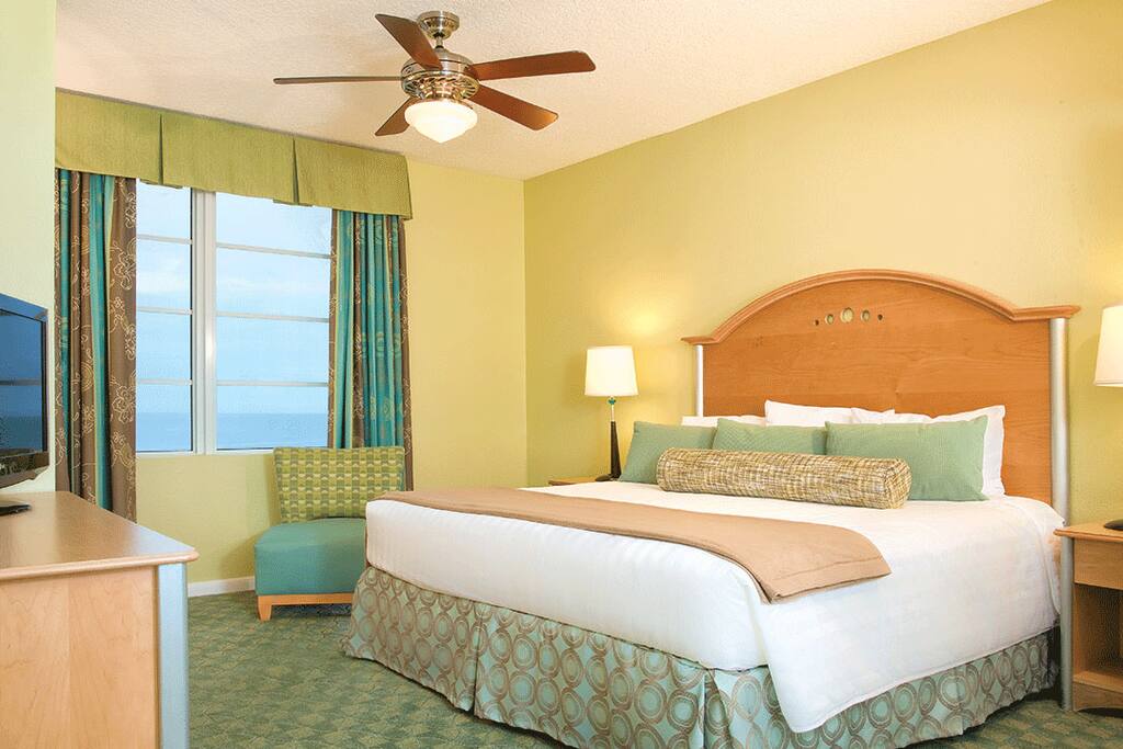 Master Bedroom with King Size Bed. Please Note that layouts and decor vary.