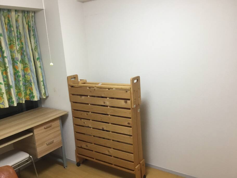Room View with Desk, Curtain, and Compact BED