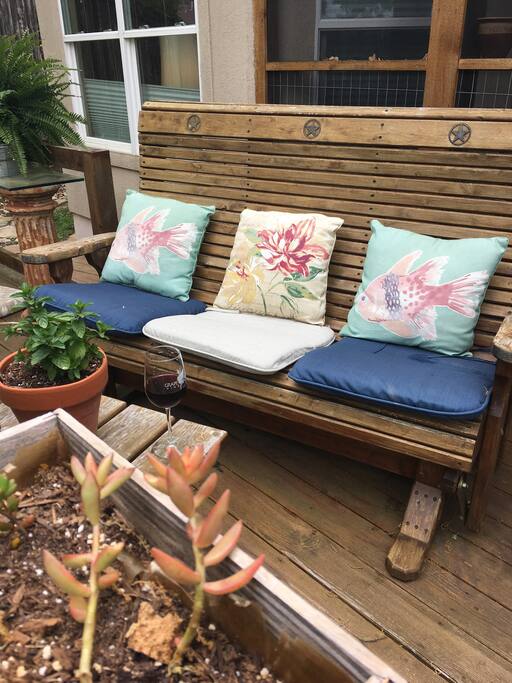 Glider on deck....great for morning coffee, evening wine. Personally i have taken many early morning naps
rocking and listening to the birds