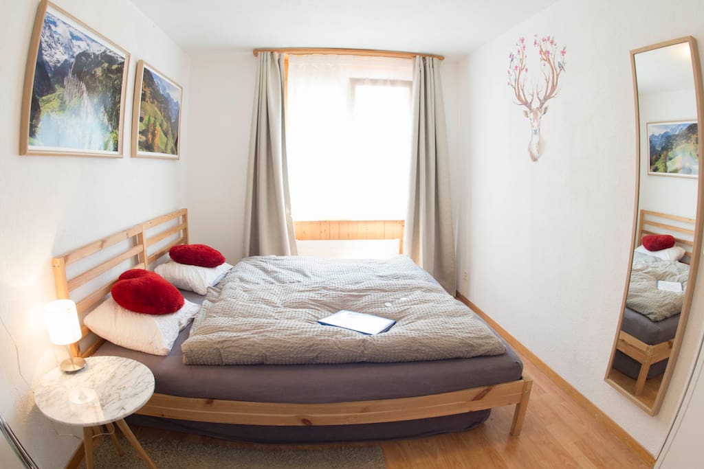 Bright room with a mountain view