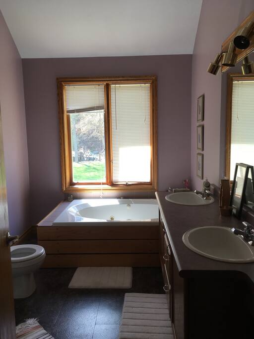 Large bathroom with tub and shower