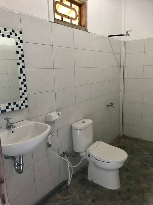 Modern clean bathroom with hot water
