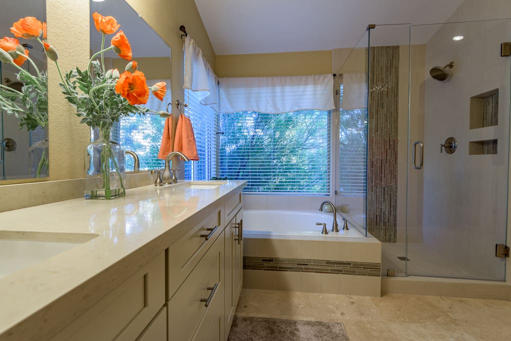 master ensuite with sunken tub, double sinks, walkin shower