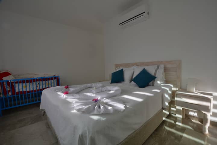 One of the rooms with the baby crib