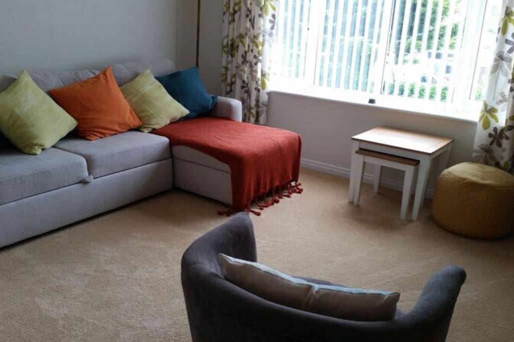 Light and airy longe with TV, DVD and Internet